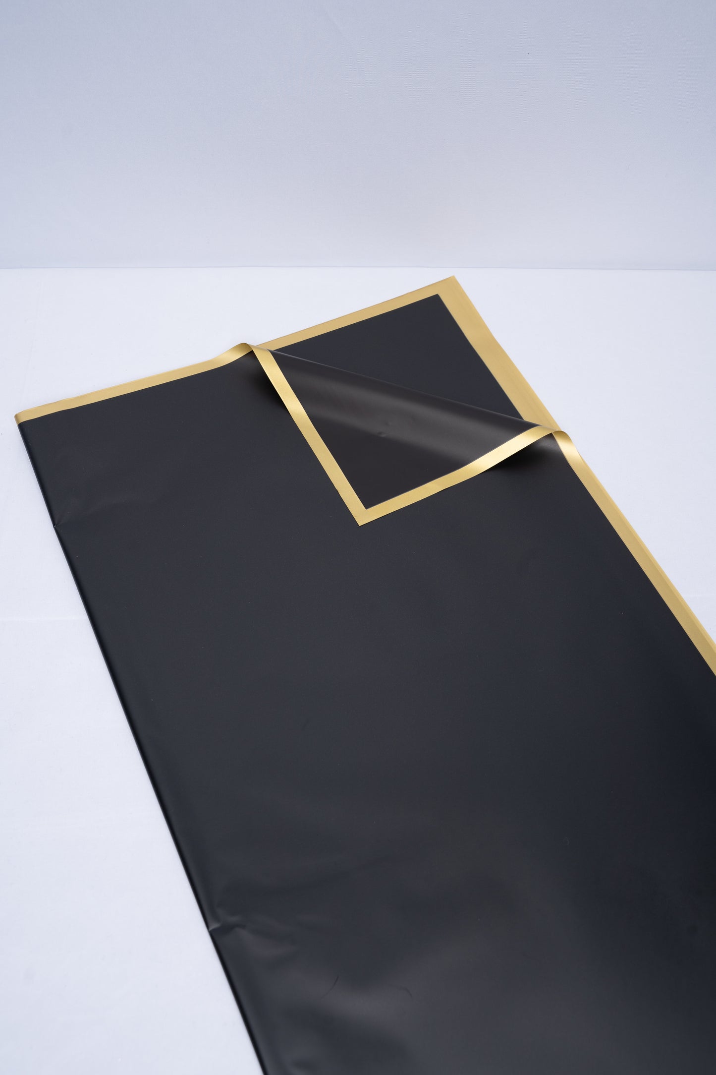 Black and gold trim paper